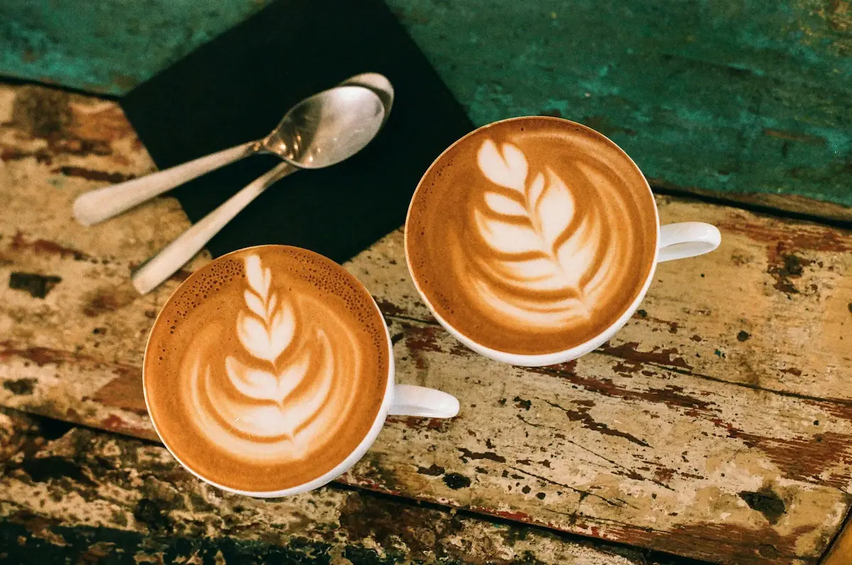 Flat white with latte art in a ceramic cup